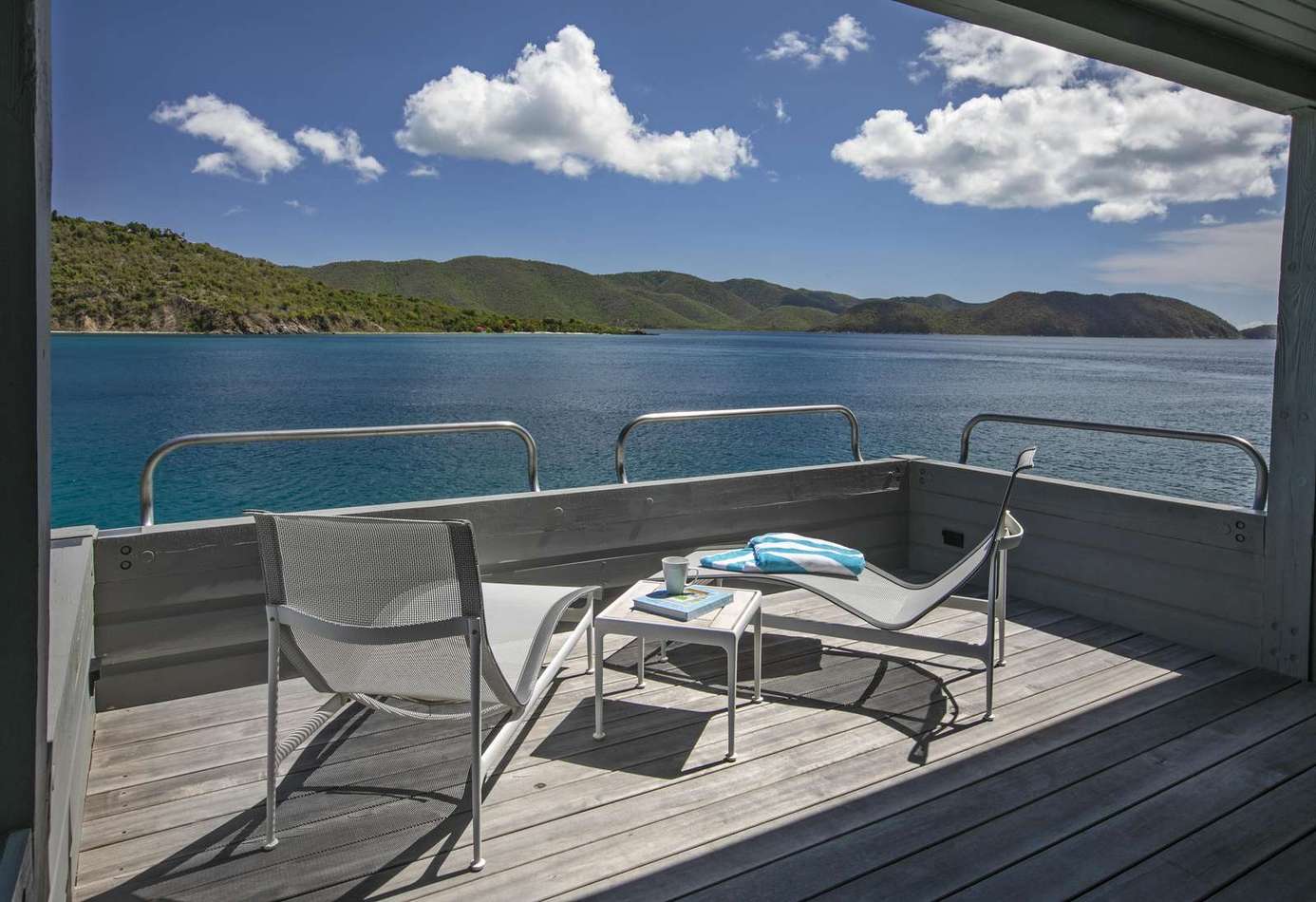 Sun-drenched deck with stunning waterfront views