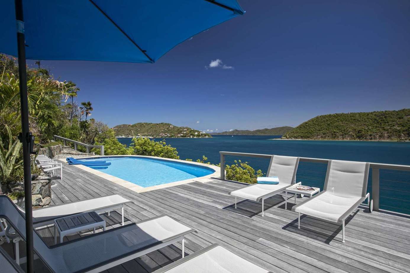 Sun-soaked pool deck with stunning ocean views