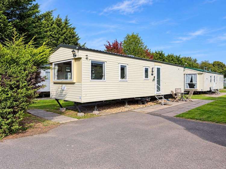 33057F⭐ – Firs area, 3 bed, 8 berth caravan with D/G and electric panel heaters. Emerald rated. Preview 0