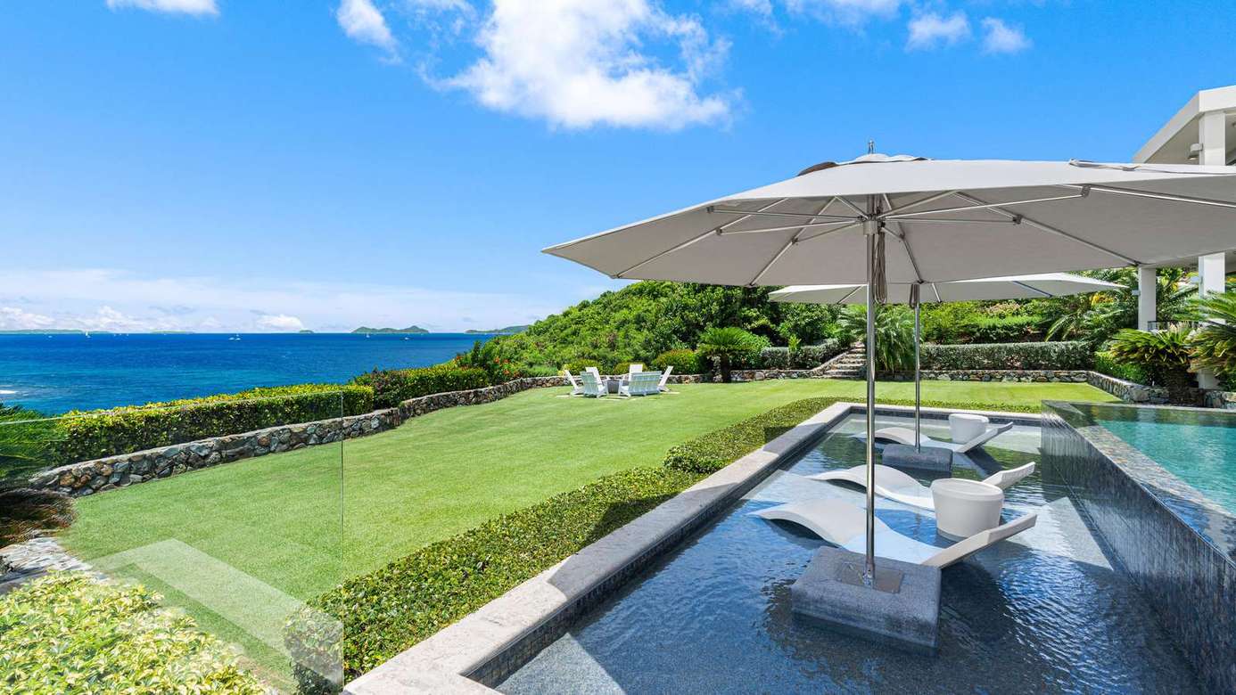 Oceanfront patio with pool and panoramic coastal views