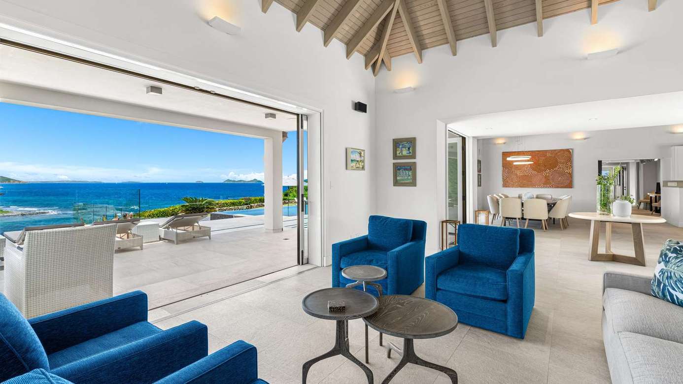 Oceanfront living room with panoramic sea views and modern comfort