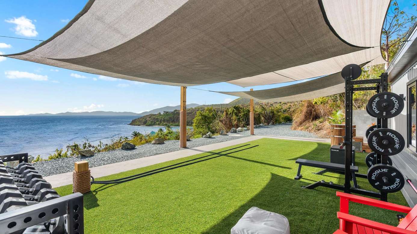 Shaded outdoor lounge with stunning waterfront views