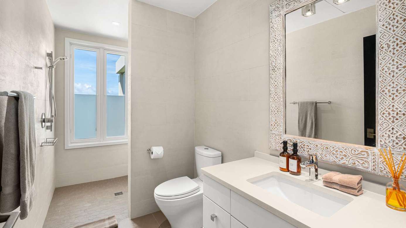 Bright, airy bathroom with modern fixtures and natural light