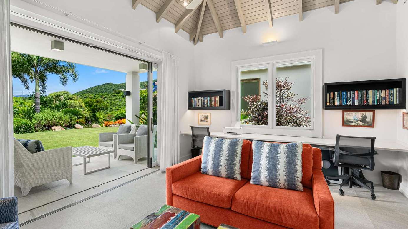 Bright living room with garden views and seamless indoor-outdoor flow