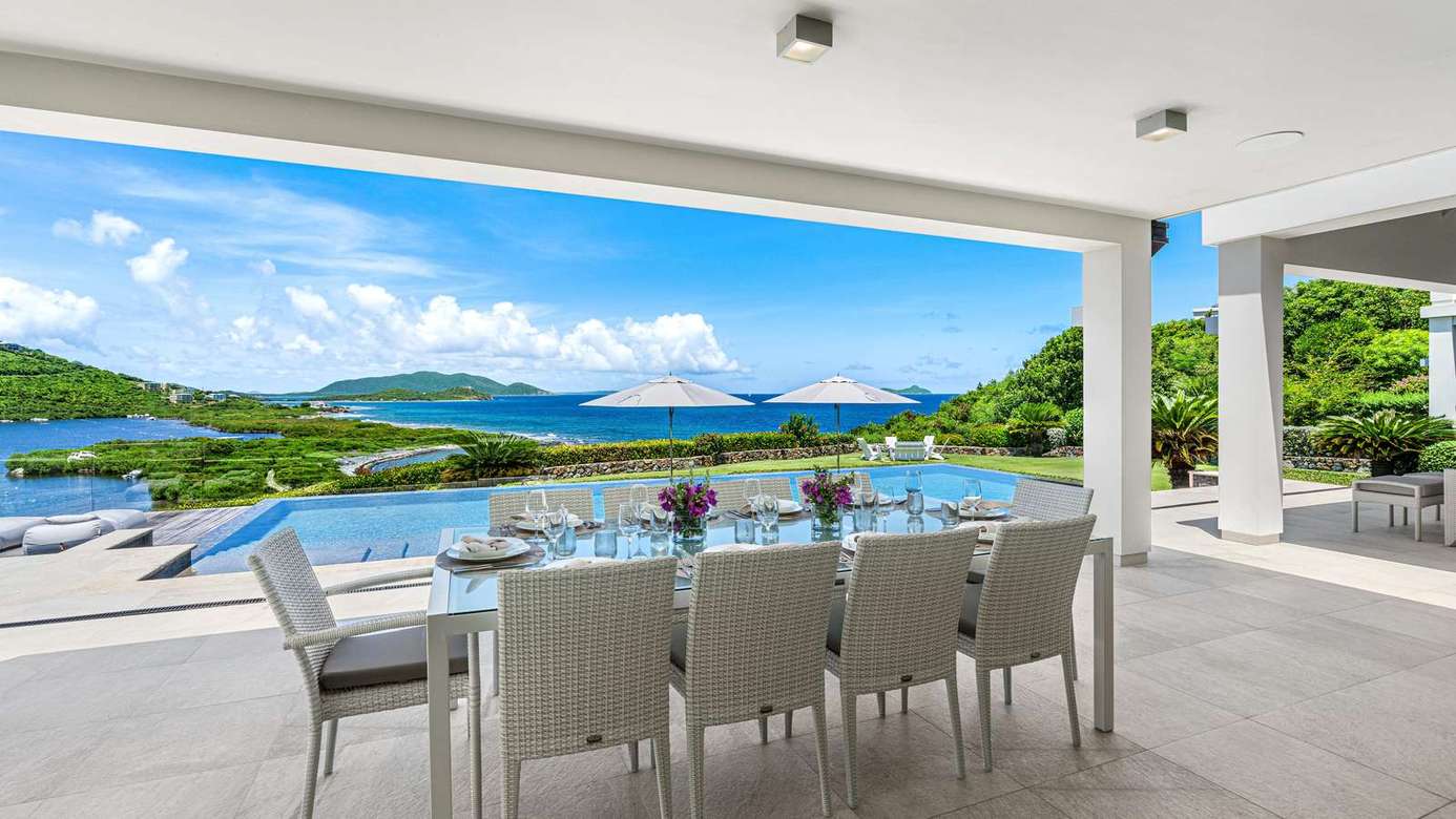Spacious outdoor dining with stunning waterfront views