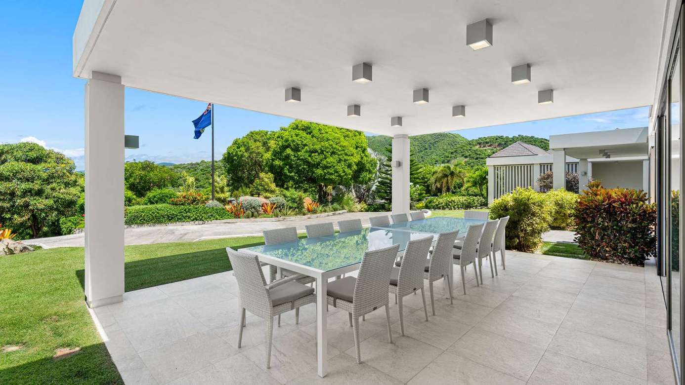 Spacious covered patio with dining for memorable outdoor meals