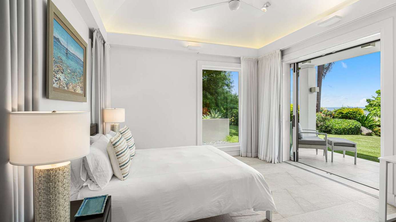 Serene bedroom retreat with garden views and natural light