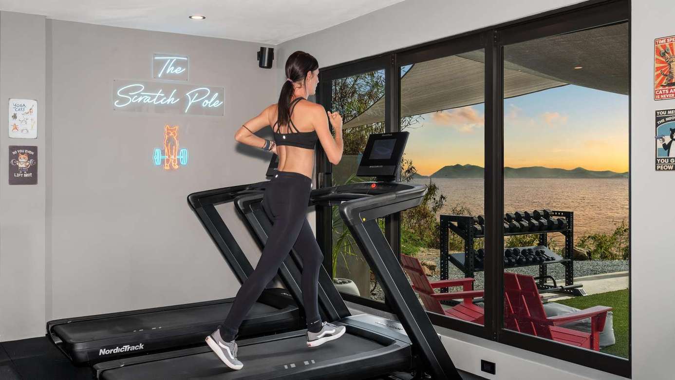 Bright home gym with scenic sunset views and fresh air