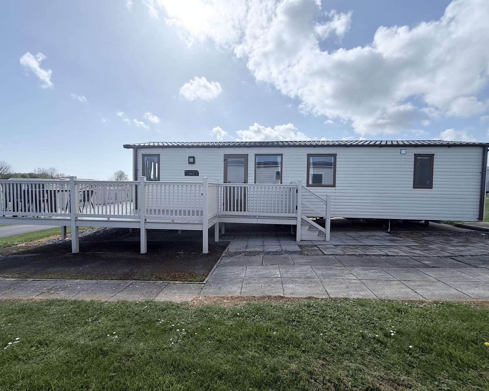 Enjoy a stay in this beautiful caravan on Sand Le Mere Holiday Park. With its decking and outside furniture you can unpack, rest and relax in the sunshine. Enjoy a break in Yorkshire this summer with the whole family. - property