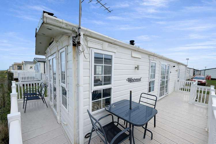 62047O⭐ – Oakridge area, 2 bed 4 berth caravan with full sea view, decking, D/G and C/H. Ruby rated Preview 0