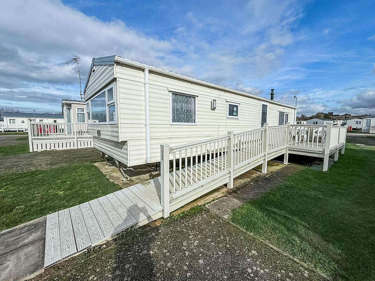23035C⛱️ – Chelsea area, 2 bed, 6 berth caravan with decking, D/G and C/H. Ruby rated. Preview 0