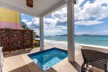 Private beachfront patio with plunge pool and ocean views