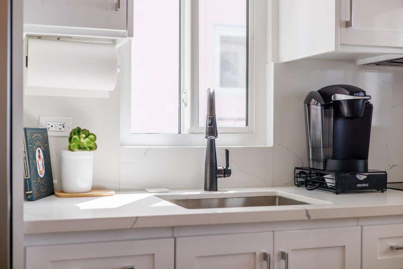 Bright kitchen nook with modern coffee station and natural light