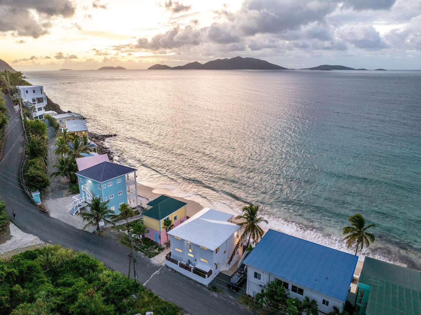 Oceanfront view with stunning sunsets and beach access
