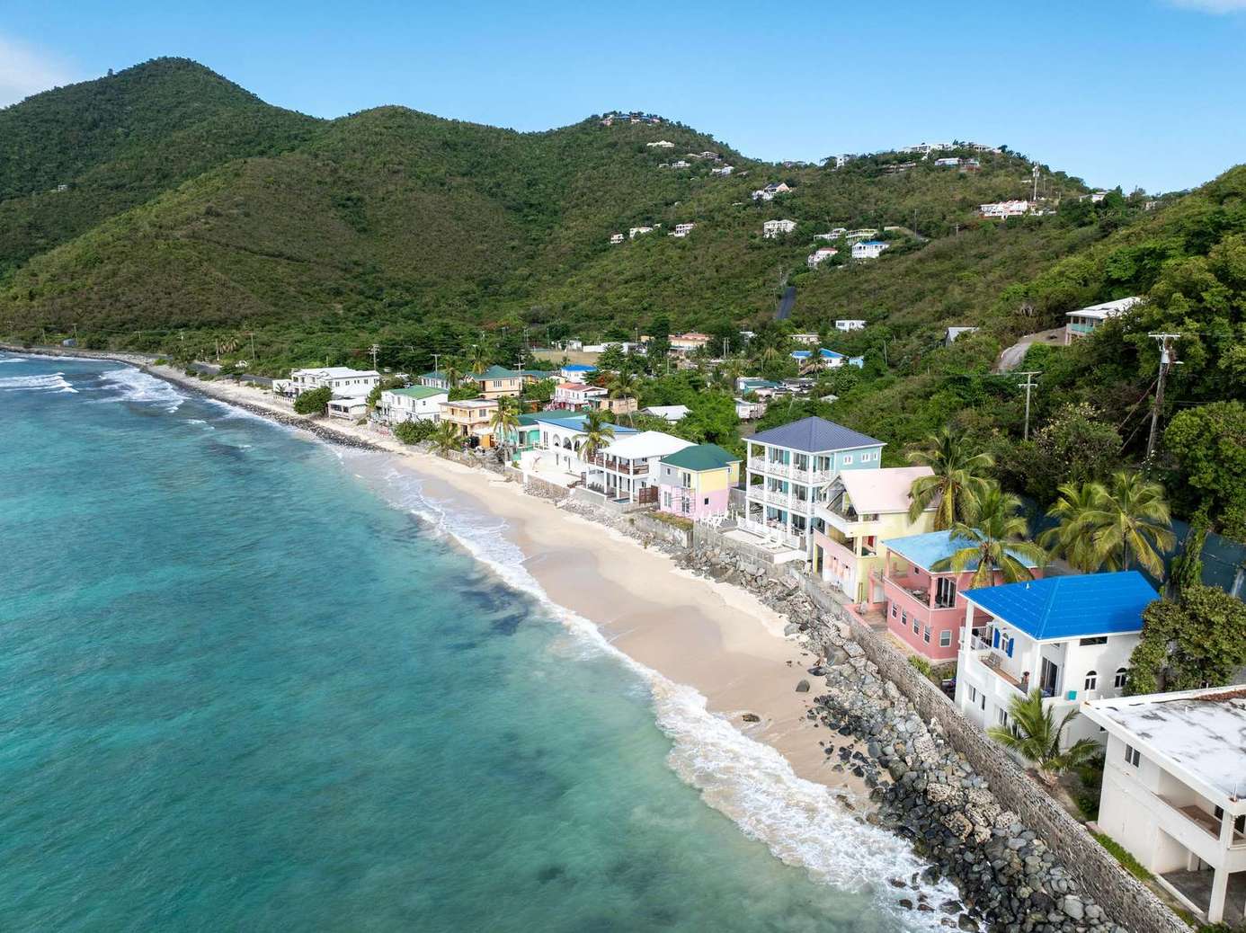 Oceanfront escape with stunning beach and mountain views