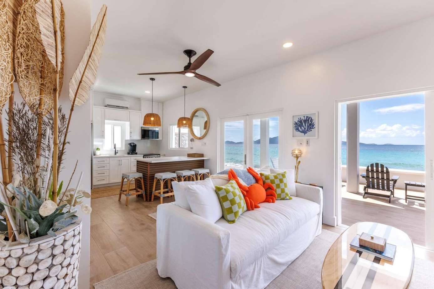 Bright, airy living room with ocean views and coastal charm