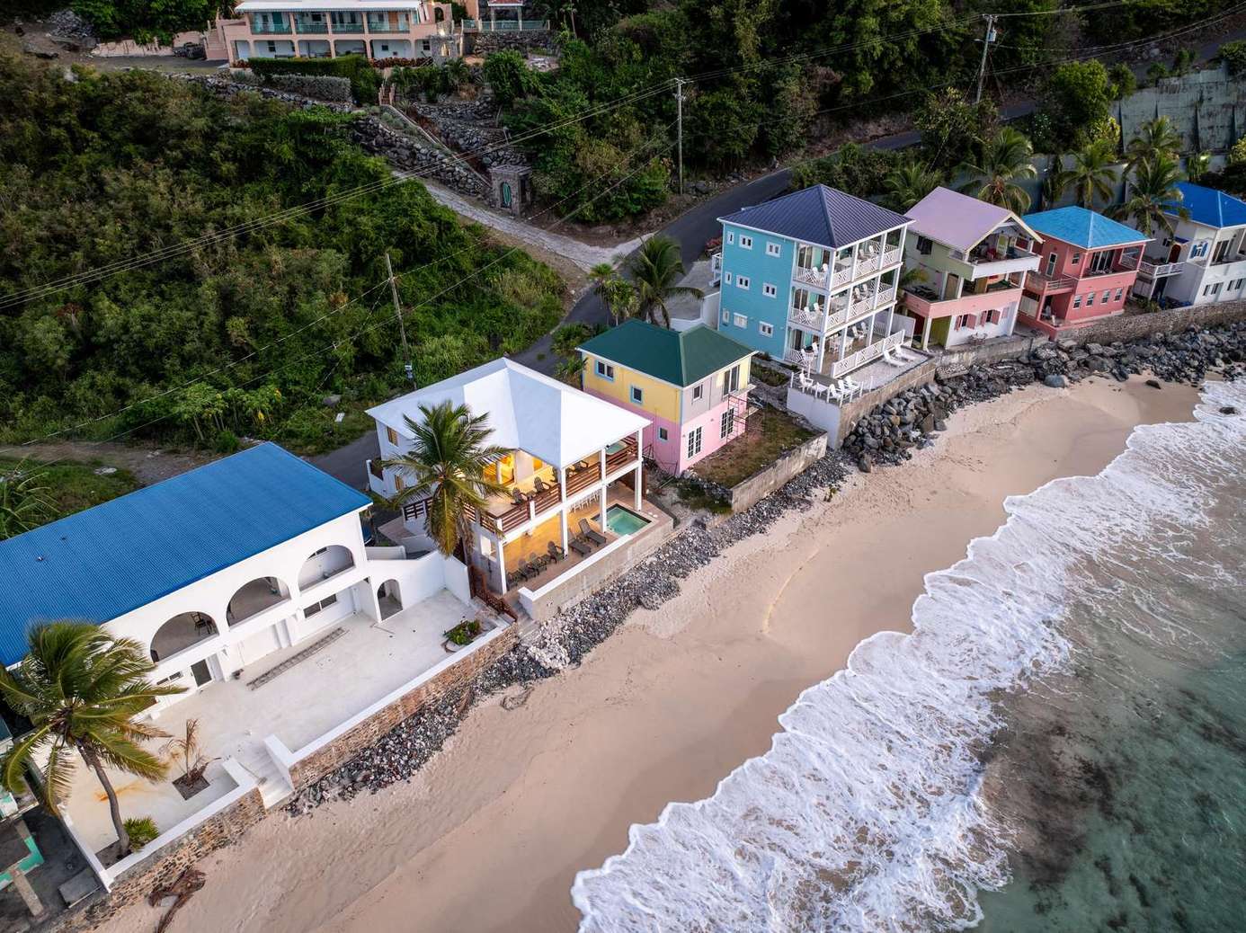 Oceanfront retreat with direct beach access and vibrant views