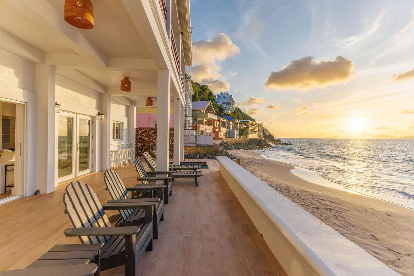 Oceanfront patio with stunning sunset and coastal views