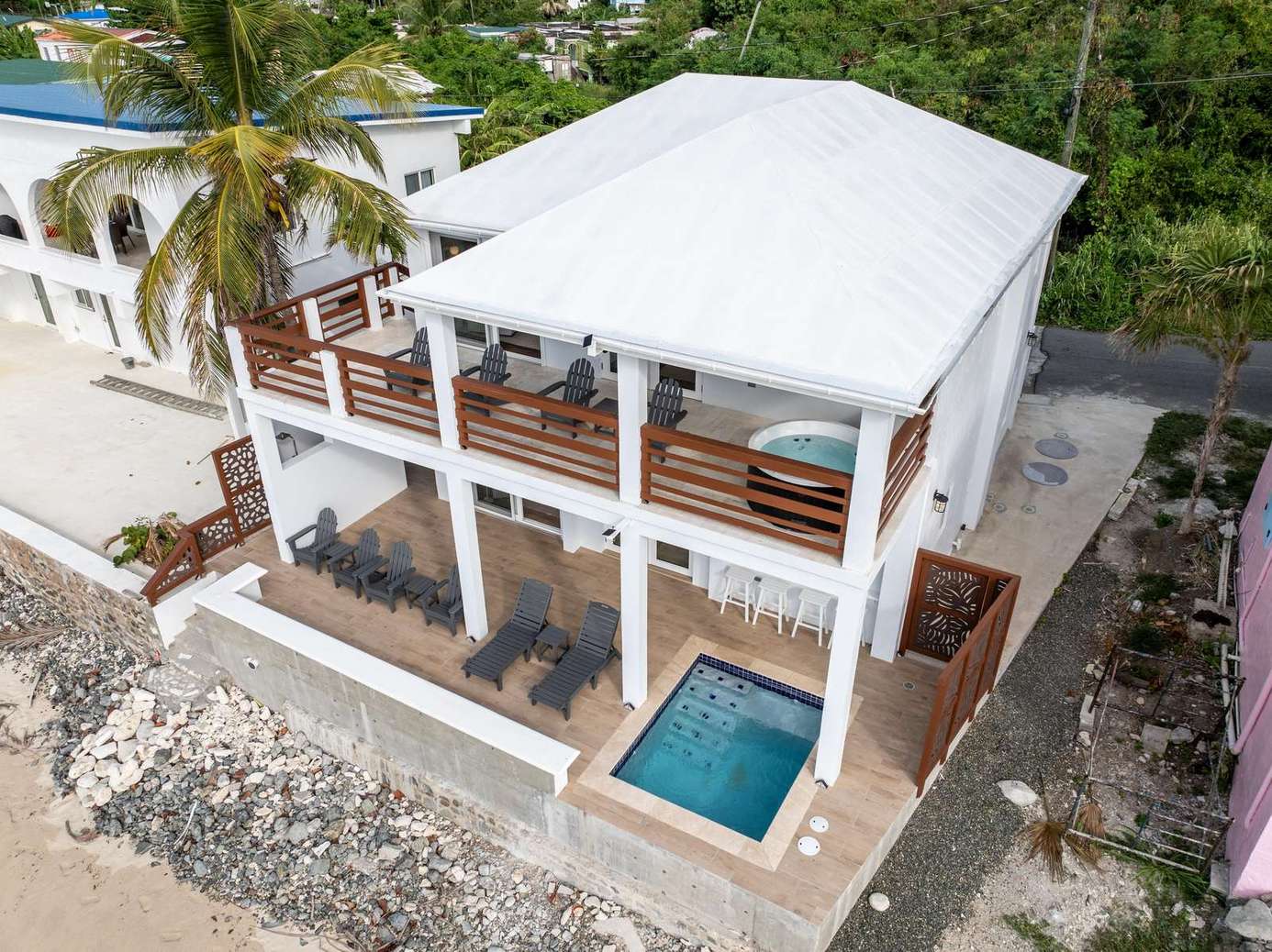 Spacious beachfront patio with private plunge pool and ocean views