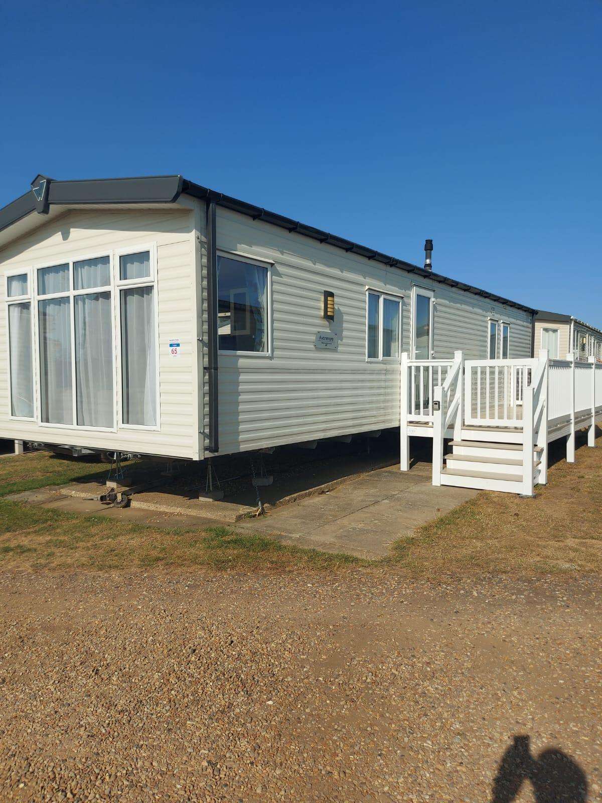 Breathe in the fresh sea air and soak in the warm sunshine with this enclosed decking area. - property