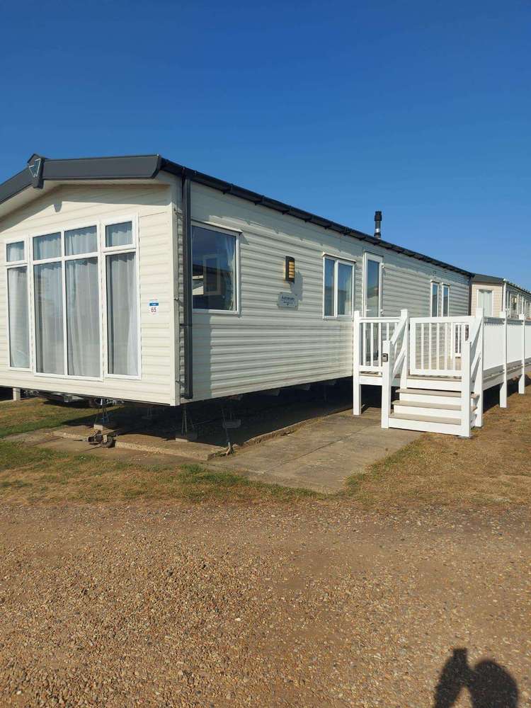 23065T⛱️ – Tudor, 3 bed, 8 berth caravan with decking to the side. Opal rated. Preview 0