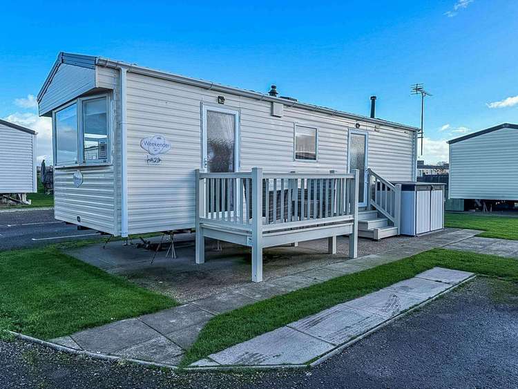 81023A⭐ – A area, 2 bed, 6 berth caravan with small side decking. Emerald rated. Preview 0