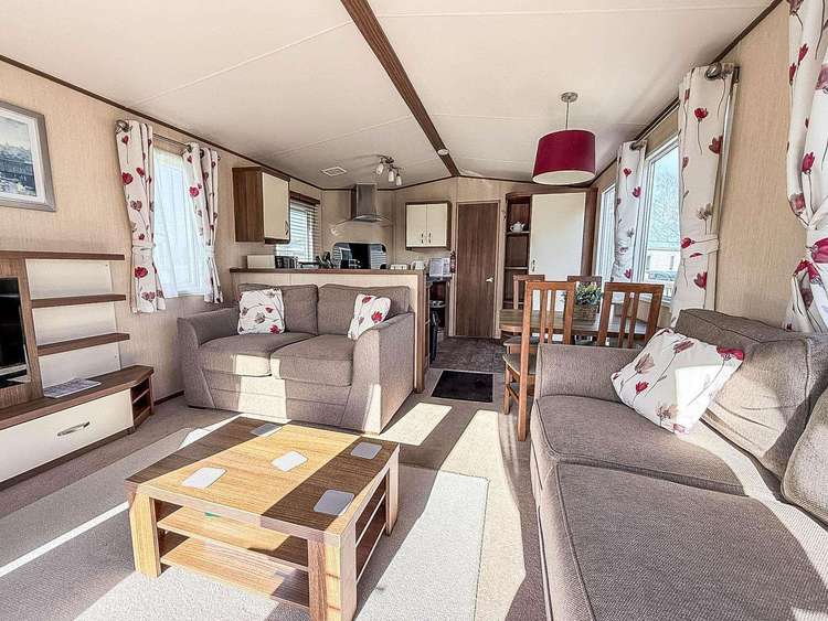 33044M⭐ – Morningside, 3 bed, 8 berth caravan with full-wrap decking and pond view. Opal rated. Preview 4