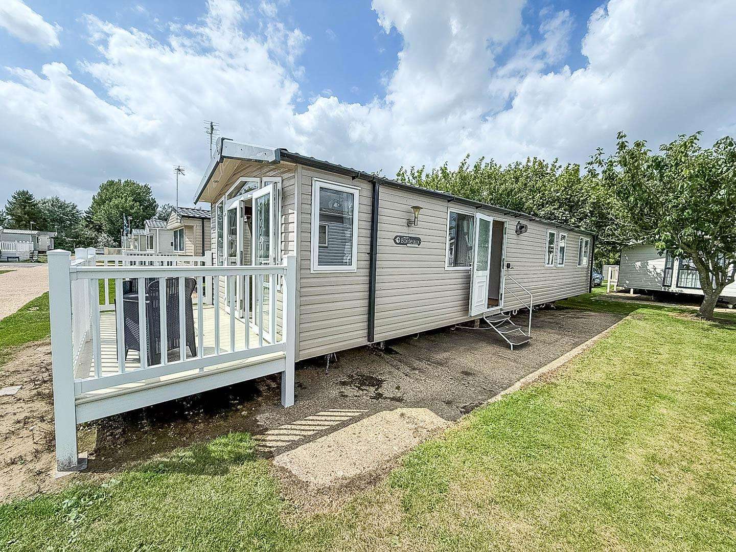 Plan your romantic getaways UK or staycation UK at Broadland Sands Holiday Park, where you can unwind in a cosy caravan with decking and explore the beauty of Great Yarmouth Norfolk. - property