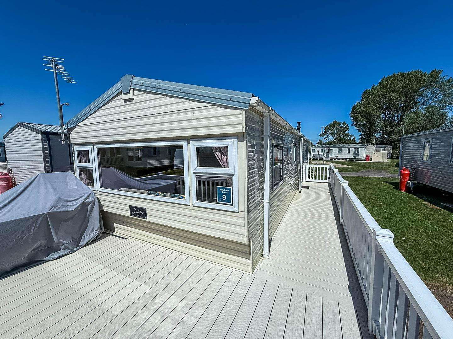 Enjoy the charm of British staycations with a dog-friendly weekend break at Naze Marine Holiday Park, offering cosy caravan holidays ideal for families. - property