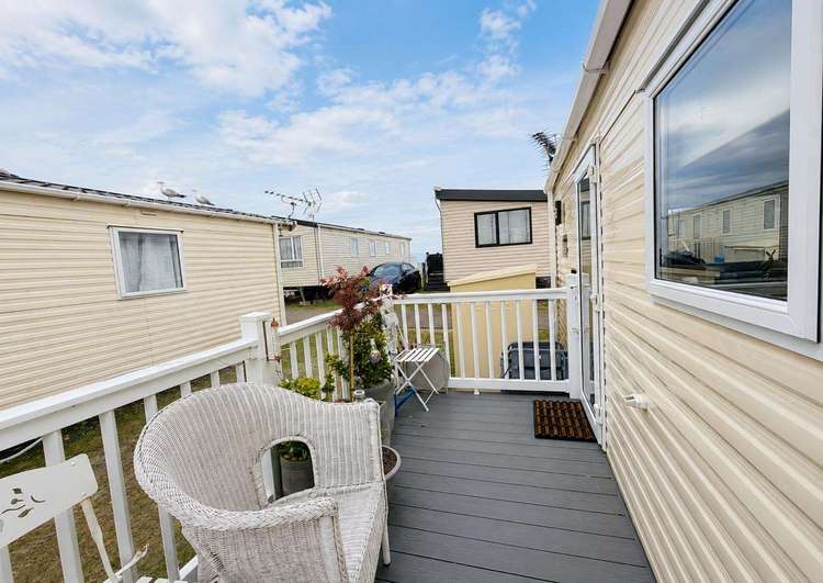 90031SV⭐ – Sea View area, 2 bed, 6 berth caravan with side decking, D/G and C/H. Ruby rated. Preview 0