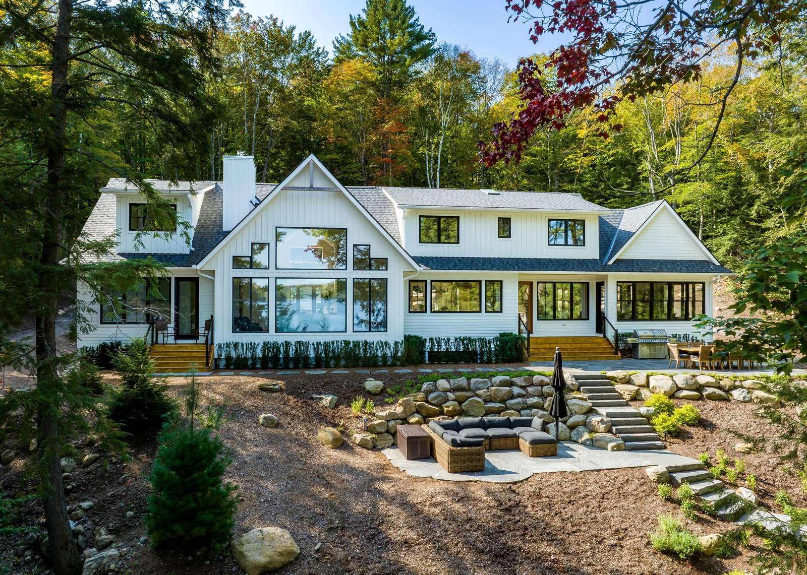 Spacious lakeside retreat with cozy outdoor fire pit area - property