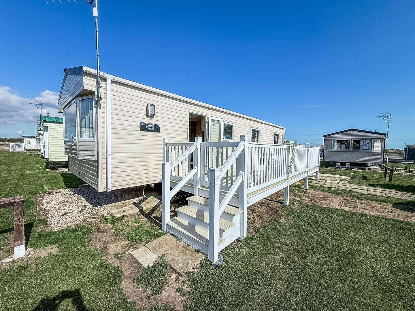 Enjoy a coastal break in St Oysth at this stunning caravan with decking. Enjoy relaxing in the sun on the deck is the perfect way to start your holiday. - property