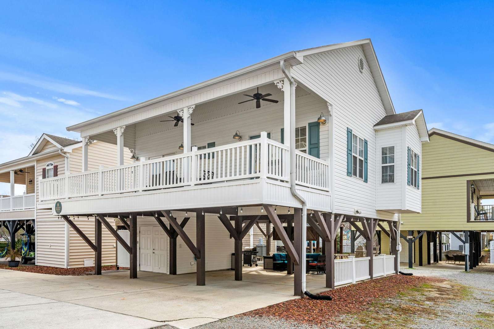 Spacious elevated porch perfect for morning coffee and sunset views - property