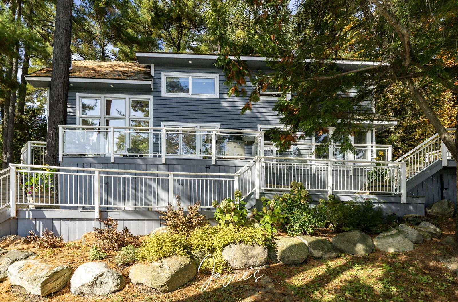 Spacious lakeside deck perfect for morning coffee and sunset views