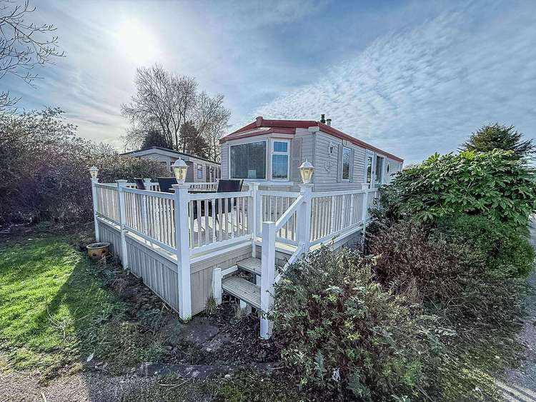 33179S⭐ – Sunrise area, 2 bed, 6 berth caravan with wrap-around decking. Ruby rated Preview 0