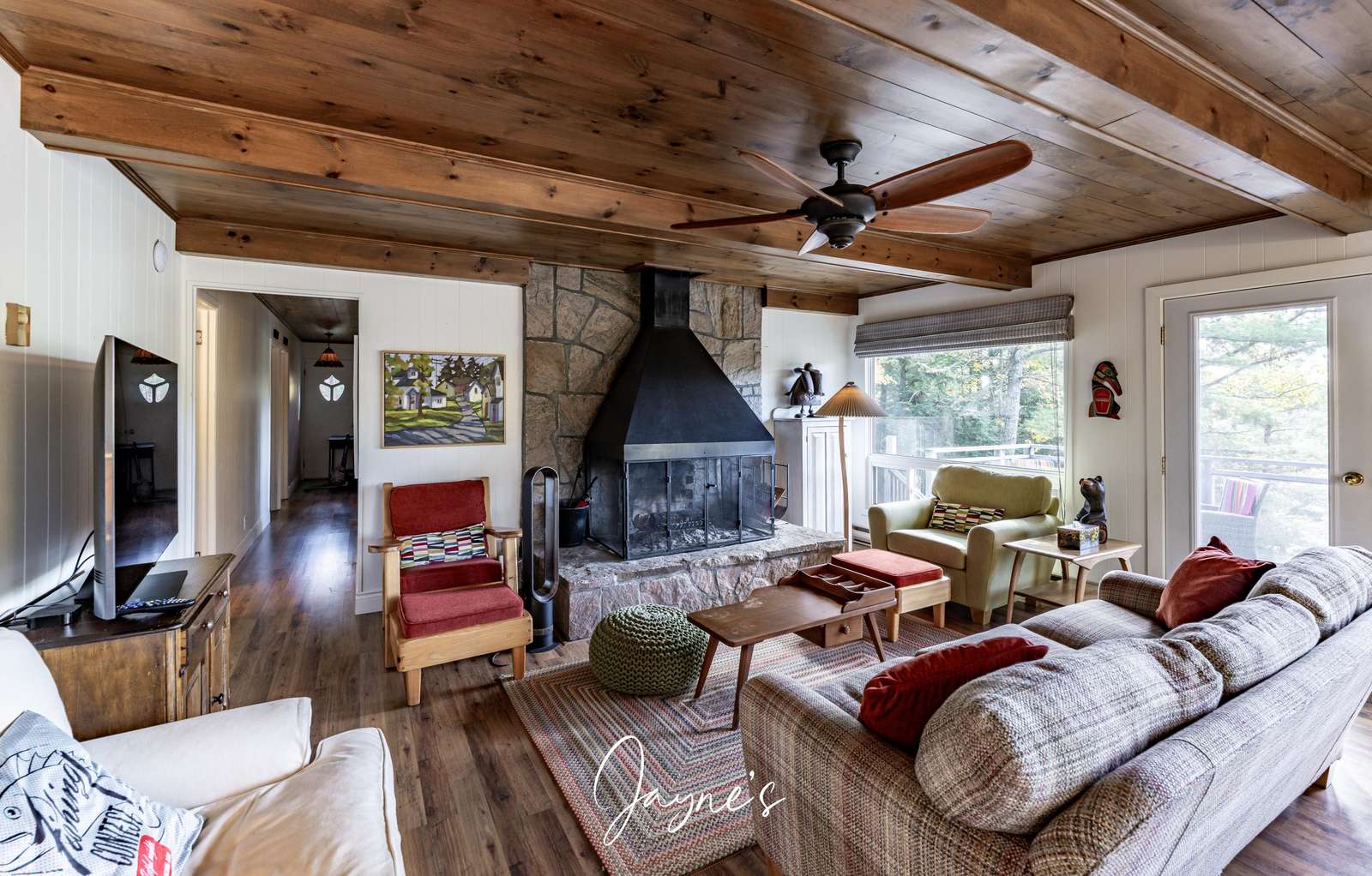 Cozy living room with rustic charm and scenic views