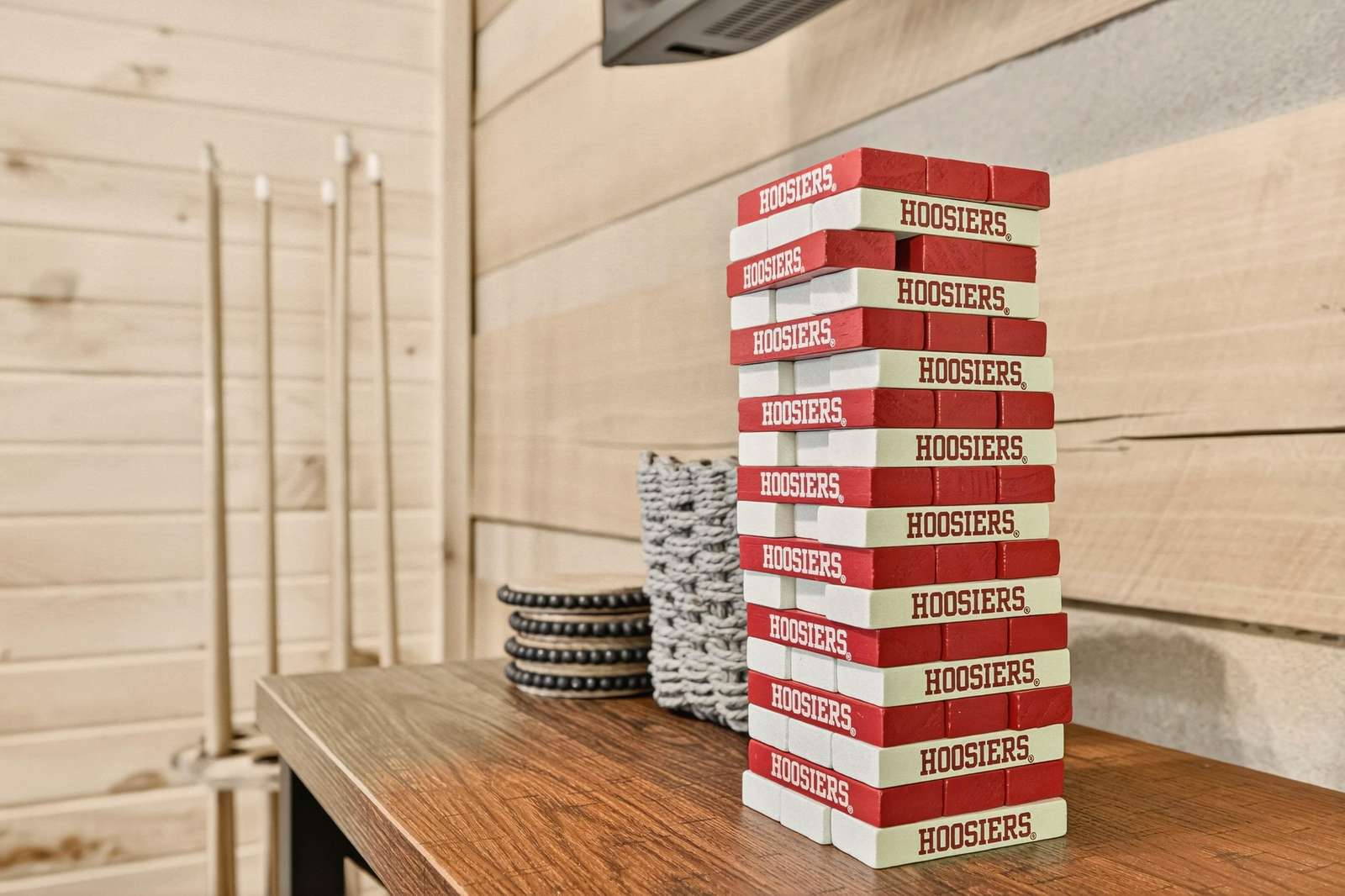 Cozy game room corner with classic Jenga and pool cues