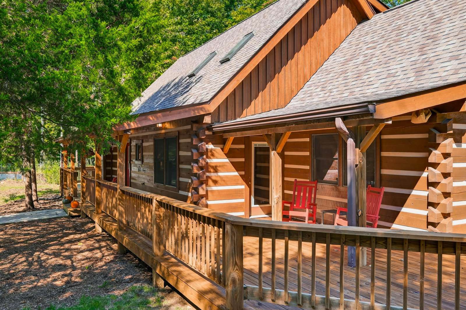 Spacious log cabin deck perfect for morning coffee and sunset views