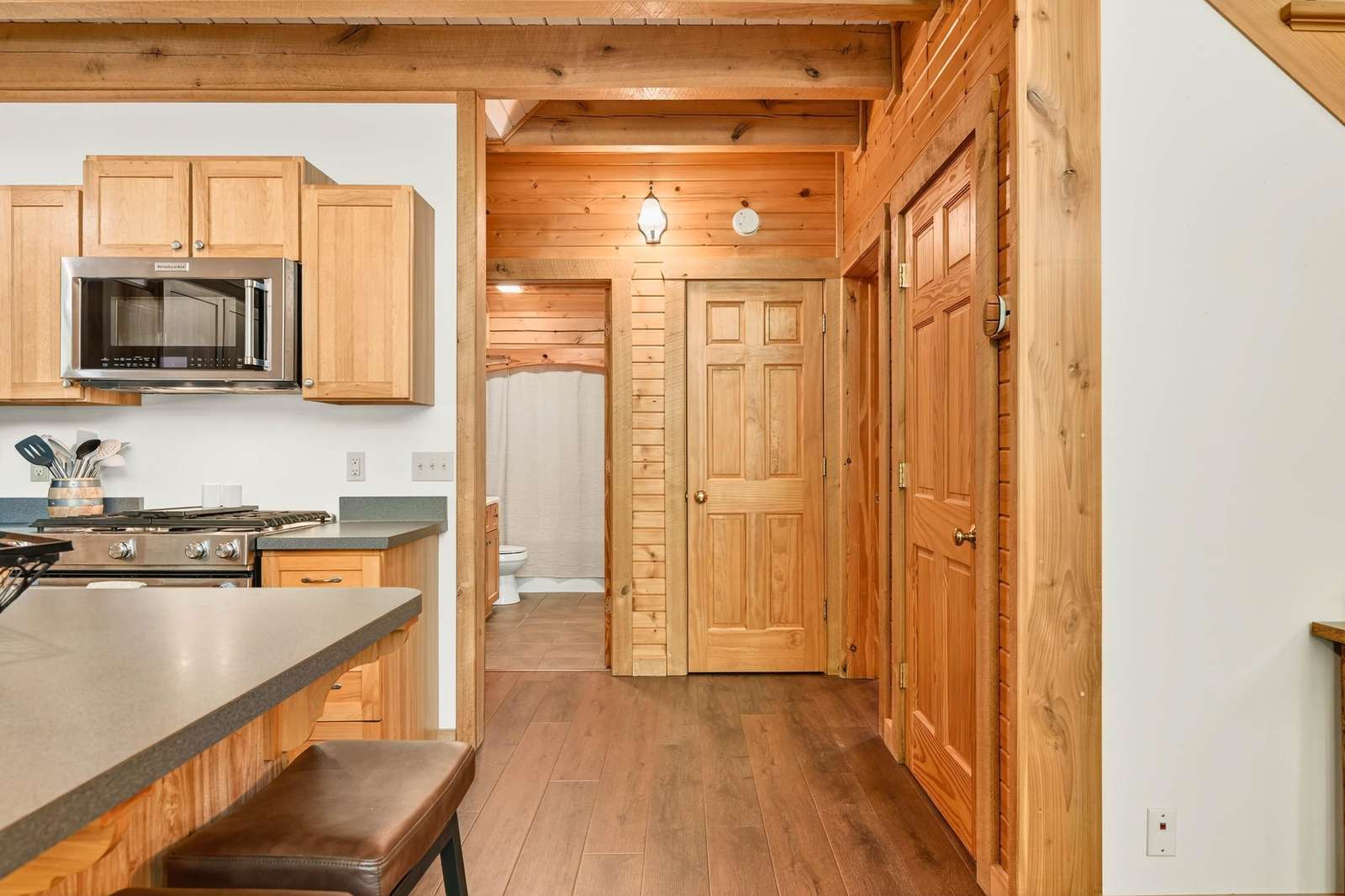 Cozy kitchen with warm wood accents and modern appliances