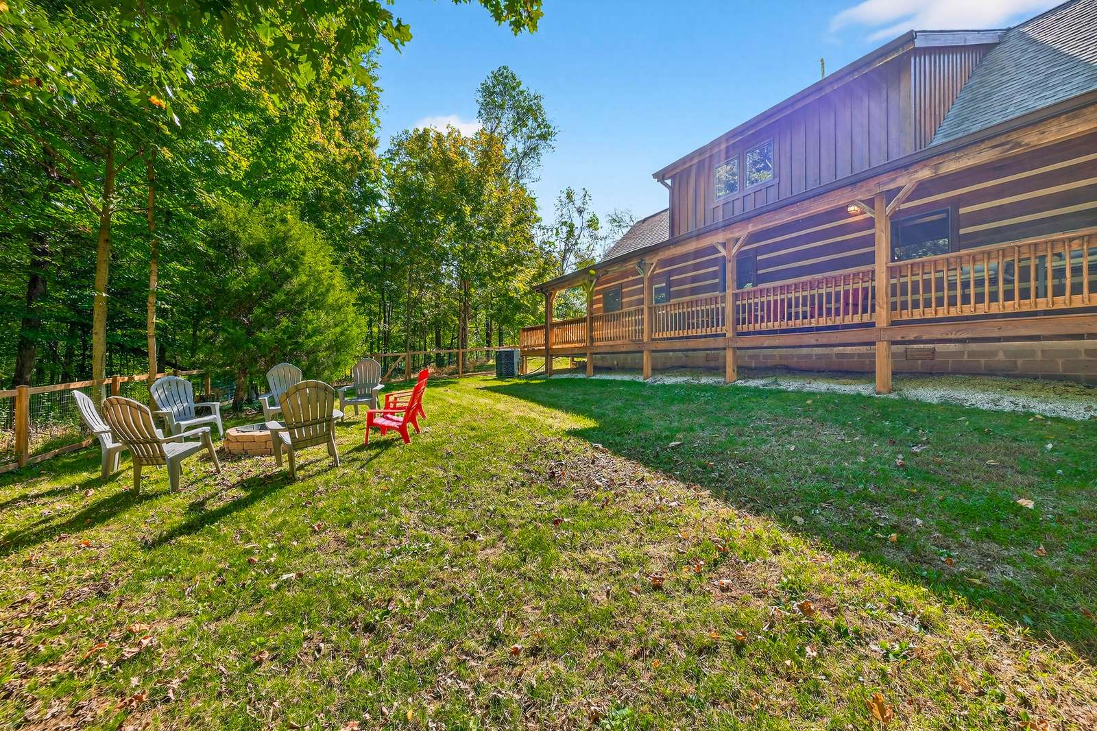 Spacious backyard retreat with cozy fire pit seating area
