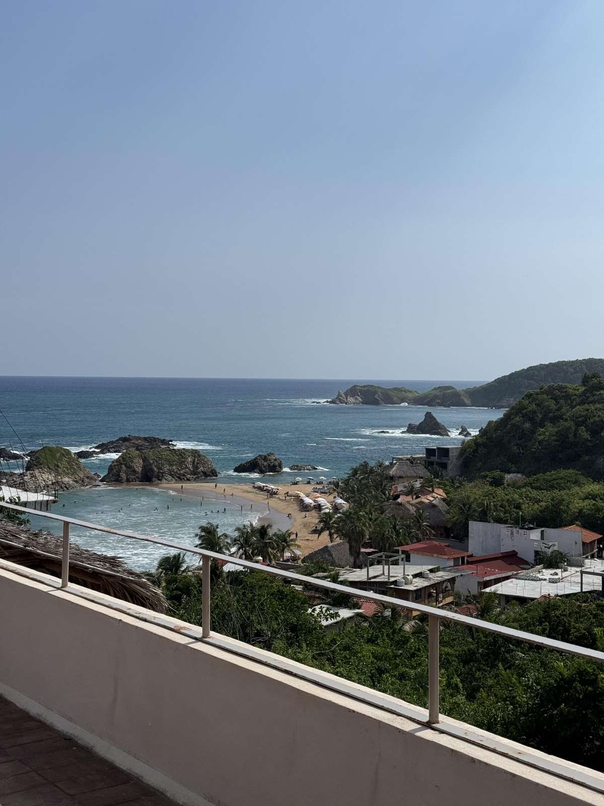 Oceanfront balcony with stunning coastal views and fresh sea breeze - property