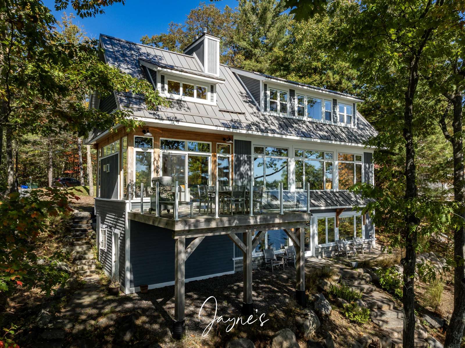 Spacious multi-level deck surrounded by tranquil forest views