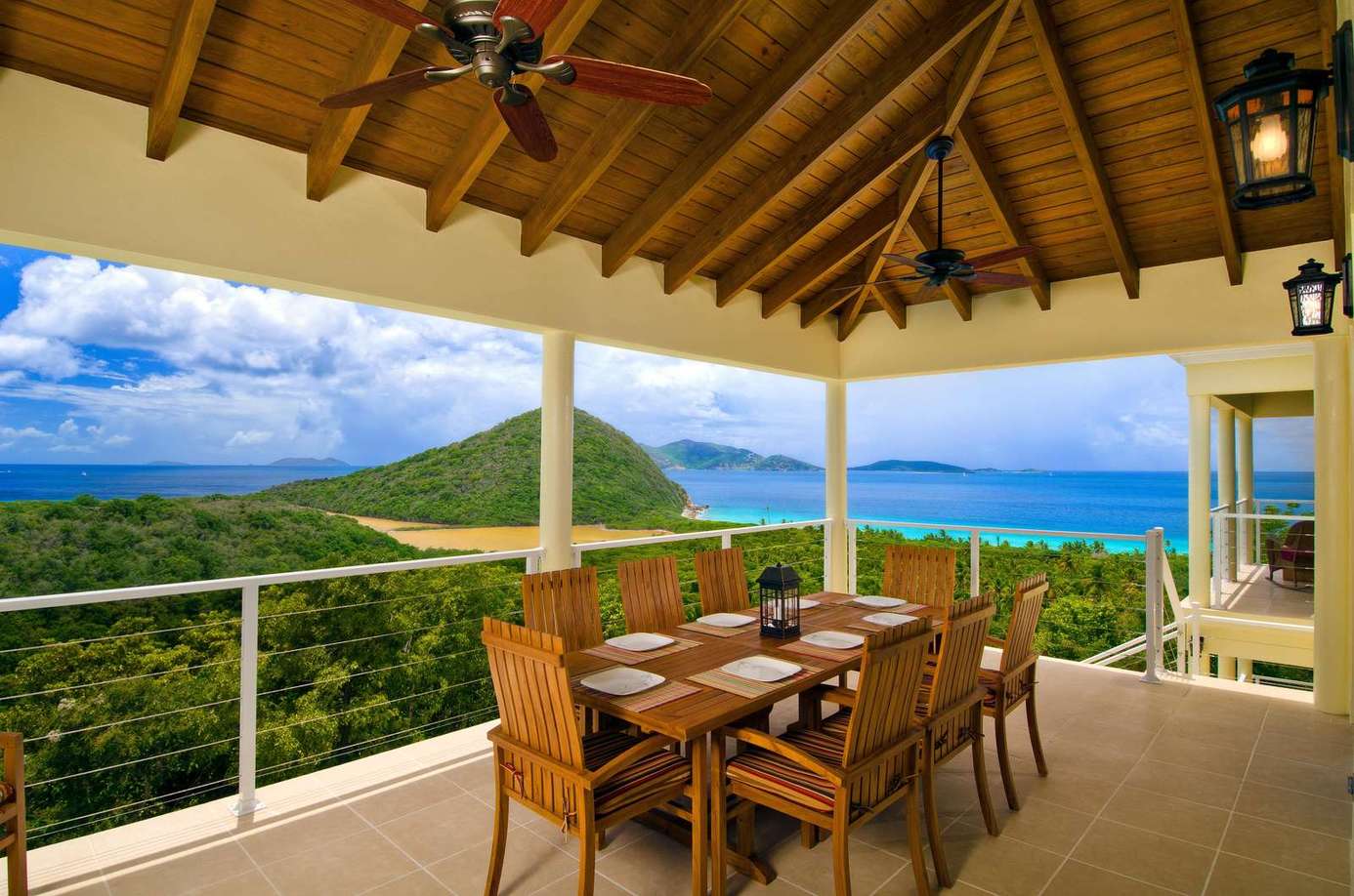 Spacious covered patio with panoramic mountain and ocean views