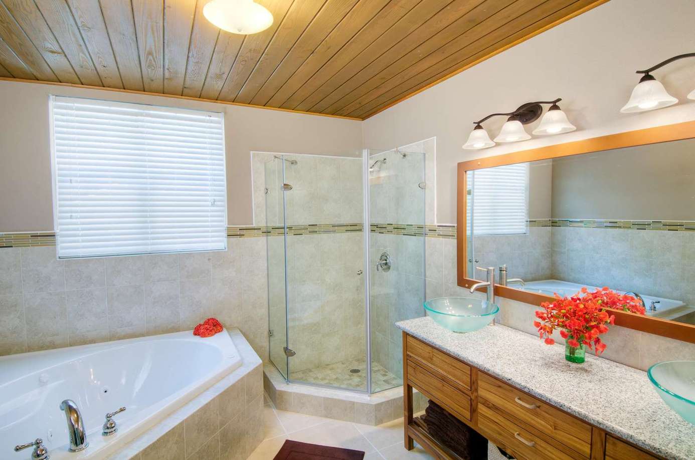 Spa-inspired bathroom with soaking tub and glass shower