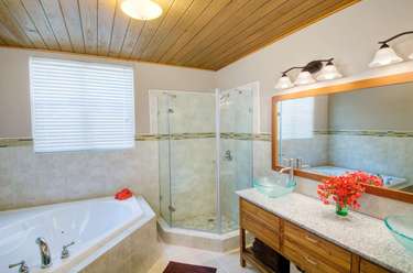 Spa-inspired bathroom with soaking tub and glass shower