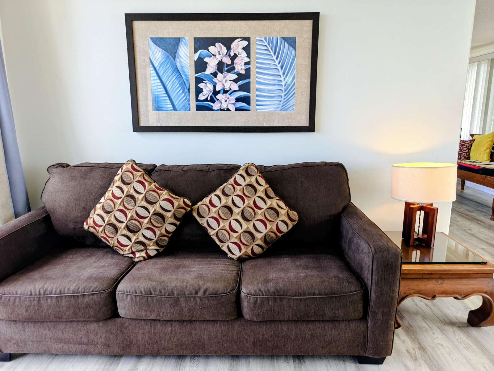 Cozy living room with plush sofa and vibrant artwork