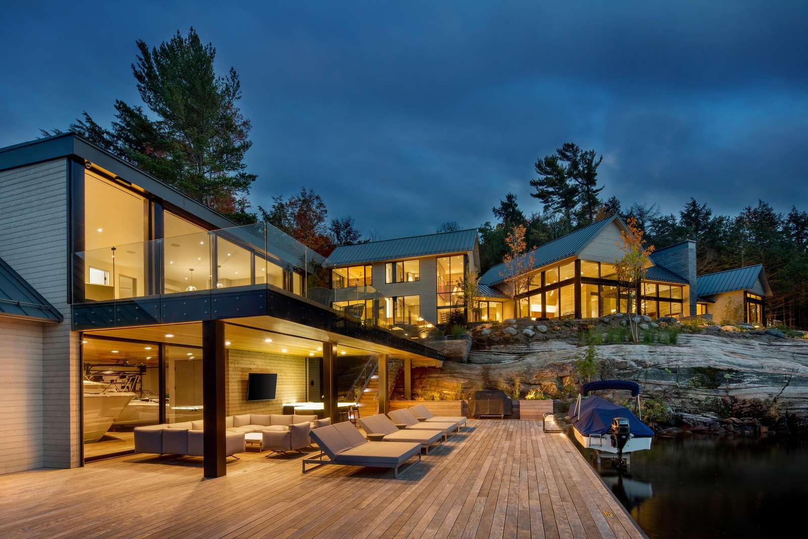 Sprawling outdoor deck with cozy seating and panoramic views - property