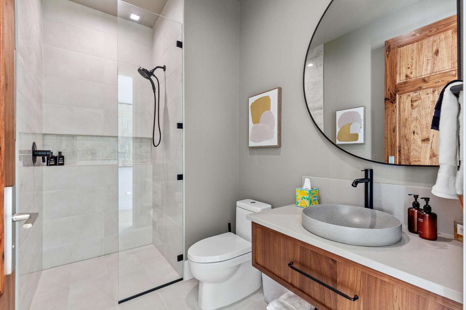 Modern bathroom with sleek glass shower and stylish vanity