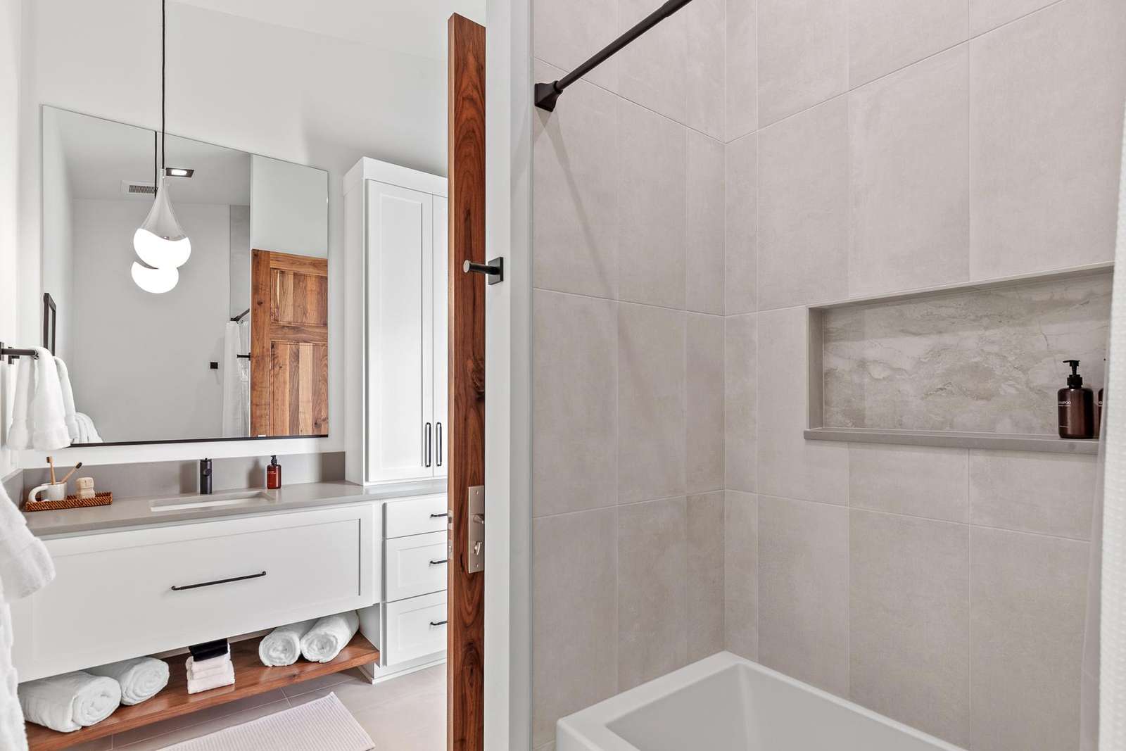 Modern bathroom with sleek shower and bright vanity area