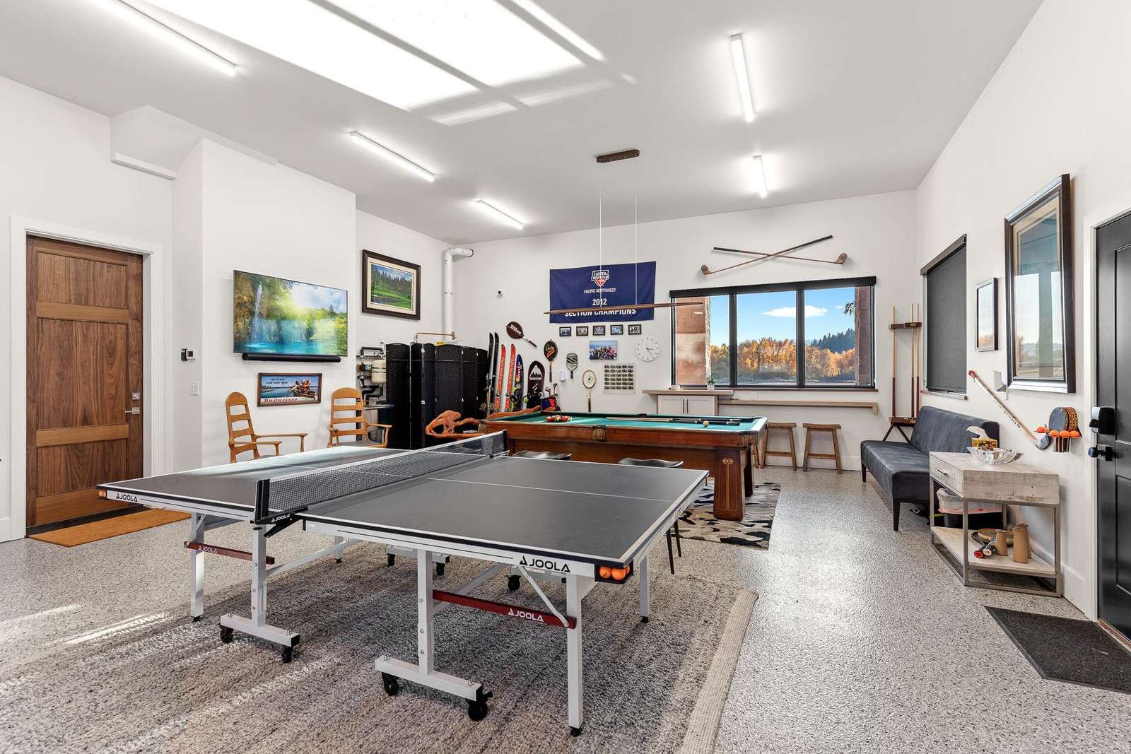 Spacious game room with ping pong and cozy seating area